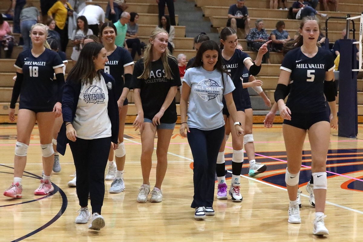 After their final win of the night, the team walks back to the sidelines. 