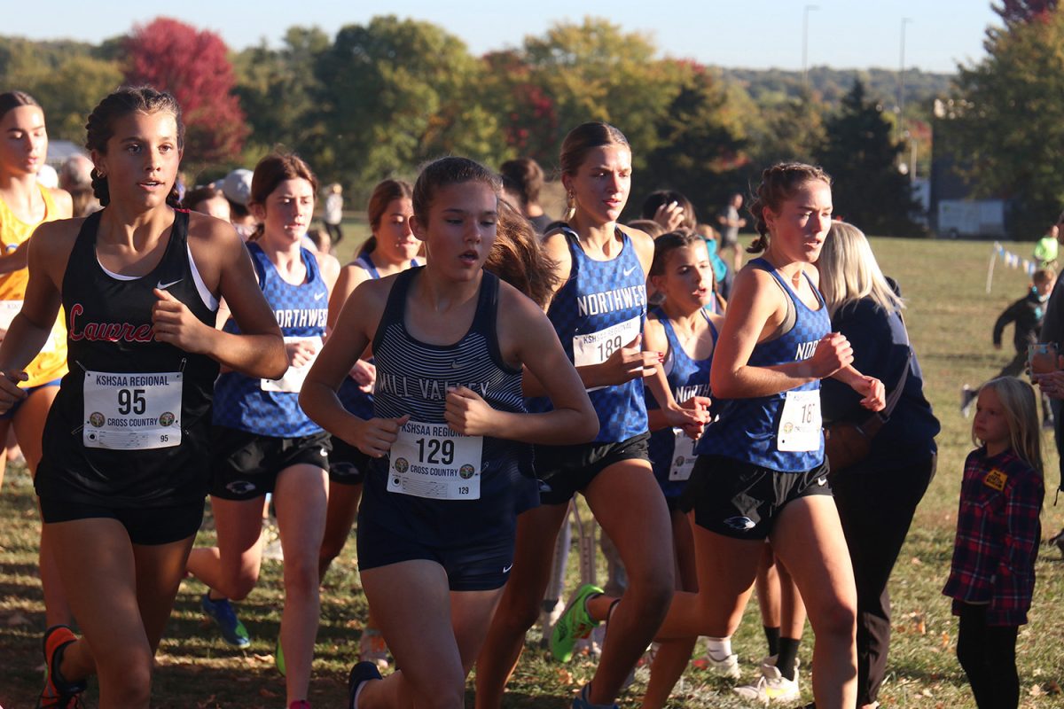Pushing herself, freshman Kate Culberson attempts to stay in the front of the pack. 