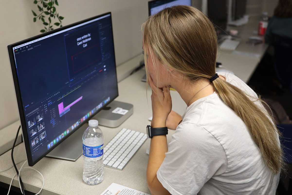 Sophomore Winter DeHaven works on the credits for her teams movie.
