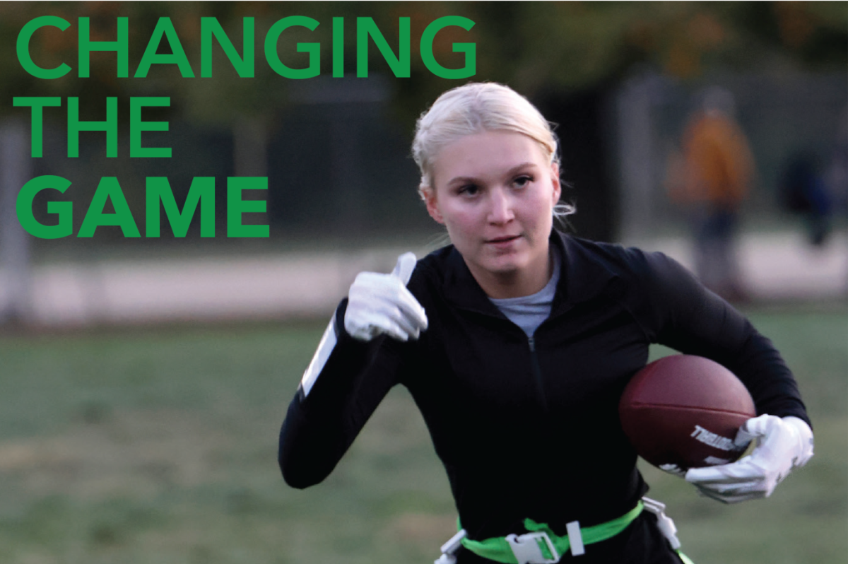 Amidst+a+hand-off+in+her+second+year+of+flag+football+practice%2C+senior+Emily+Summa+sets+her+gaze+on+the+end-zone+to+score+a+touchdown+Wednesday%2C+Oct.+18+