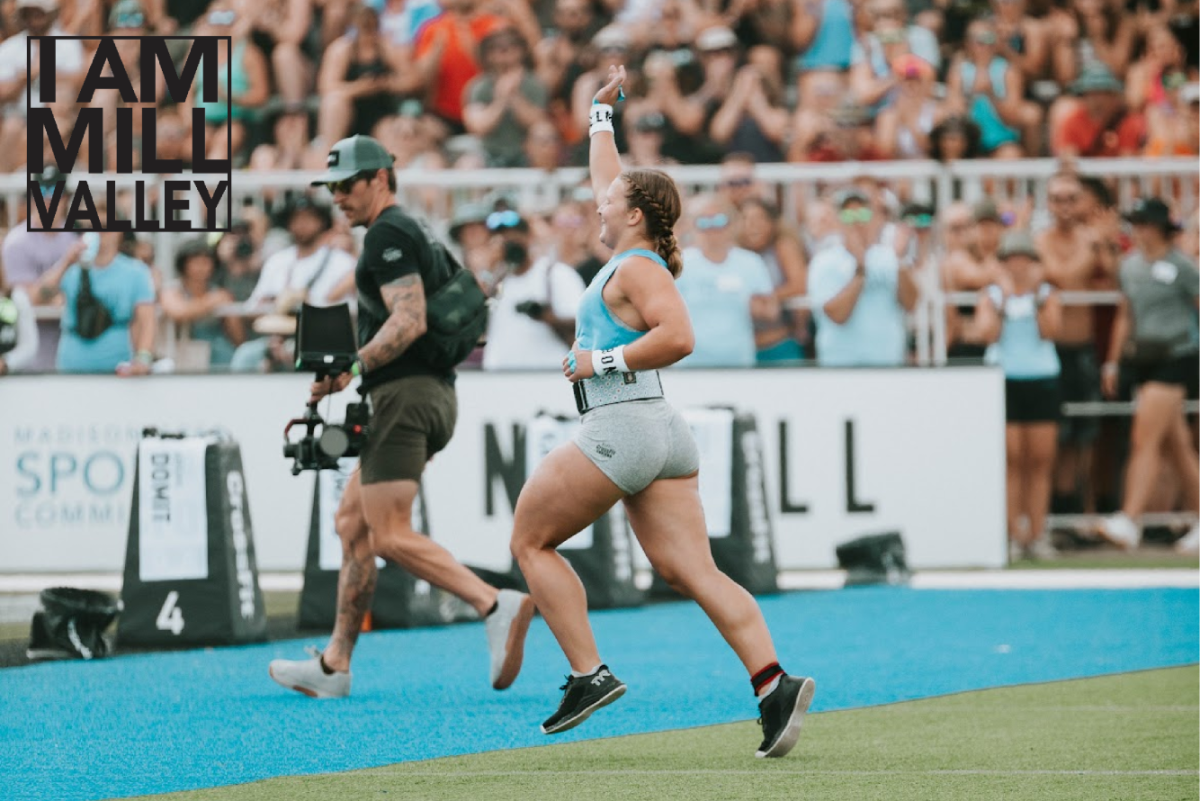 Reaching+the+finish+line+at+an+international+CrossFit+competition%2C+senior+Olivia+Kerstetter+waves+to+her+friends%2C+family+and+fans.