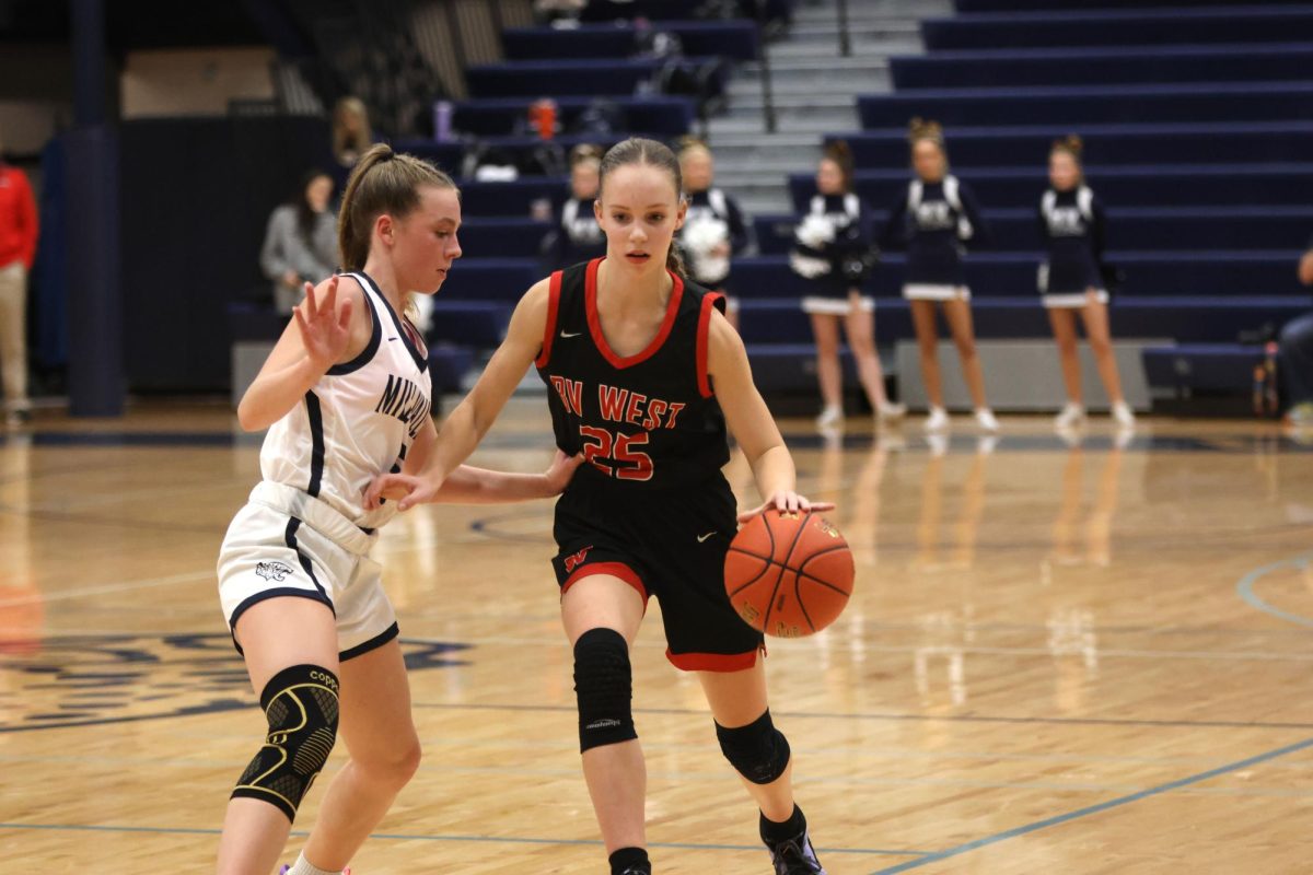 Junior Josie Benson guards her opponent  