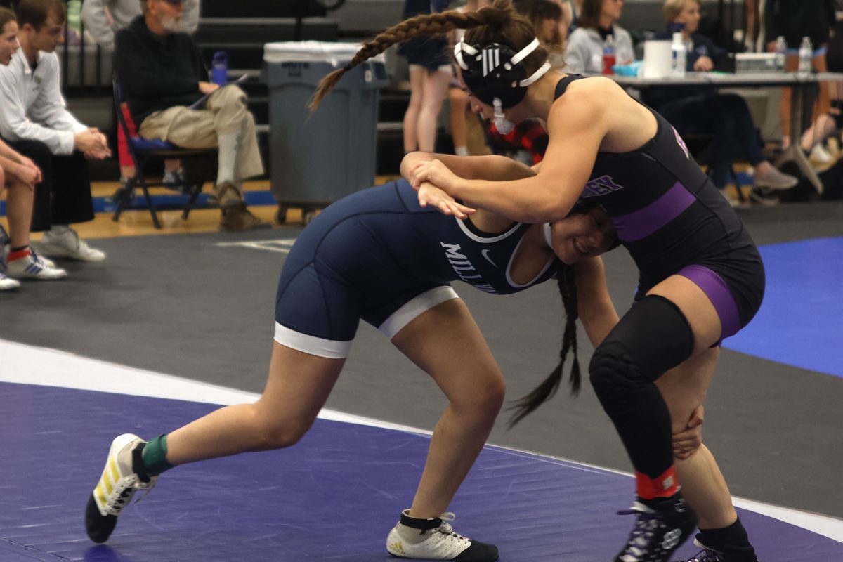 Junior Jackie Gutierrez trying to take her opponent down by the leg.