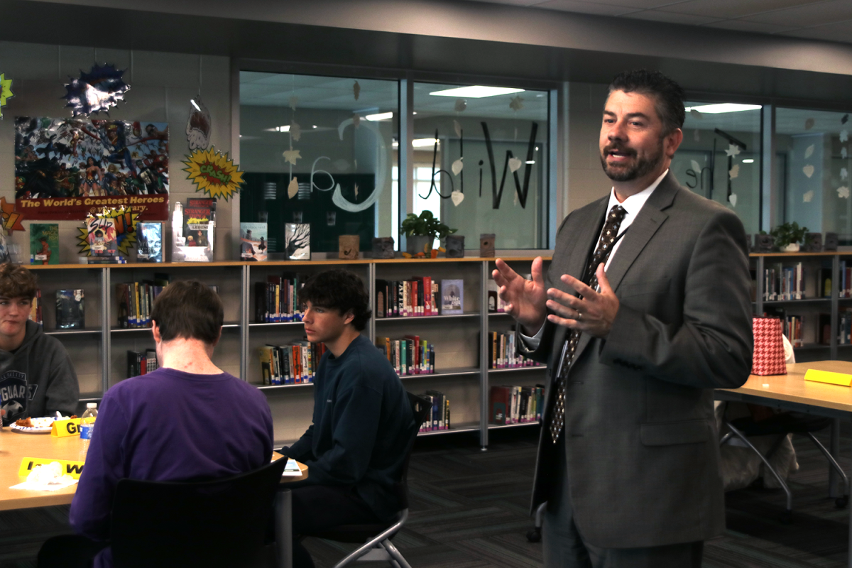 Addressing+the+student+advisory+board%2C+district+superintendent+Dr.+Cory+Gibson+explains+the+results+of+his+listening+tour+Tuesday%2C+Nov.+28.+Gibson+met+with+the+same+students+as+part+of+his+listening+tour+in+September+to+hear+their+perspective.+It+has+certainly+resonated+with+a+lot+of+people+and+as+a+result%2C+I+think+we+have+a+duty+and+responsibility+to+act+on+some+of+these+things%2C+Gibson+said.