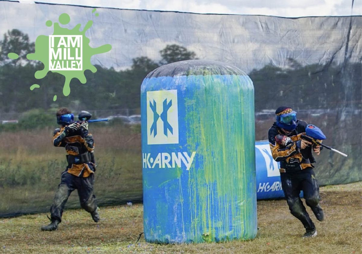 Rounding an obstacle at high speed, junior Patrick Segura and his paintball team advance on their opponents at the National Paintball competition in Florida.