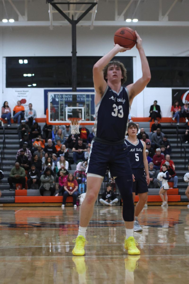 Senior Mason Kemp gets ready to shot a free throw.