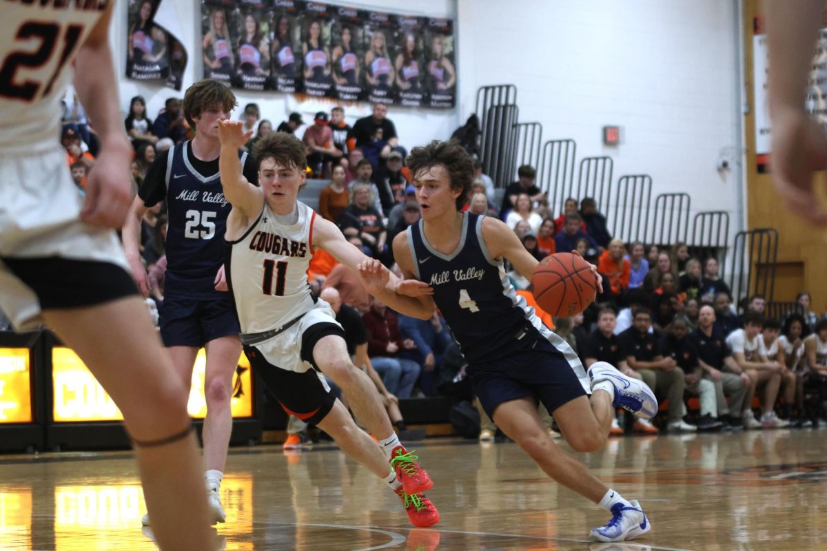 Sophomore Reece Riedel drives to the basket. 