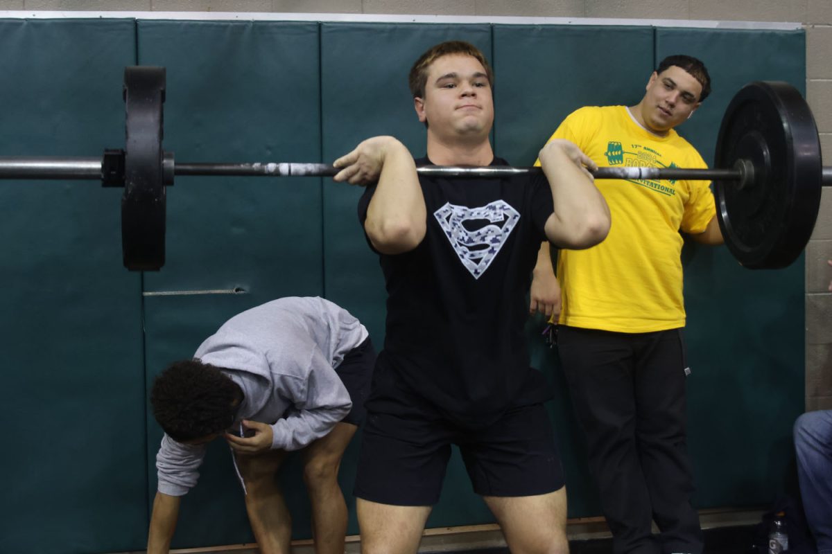 Ready to push the weights, junior Zach Zaldivar prepares himself for the next step.