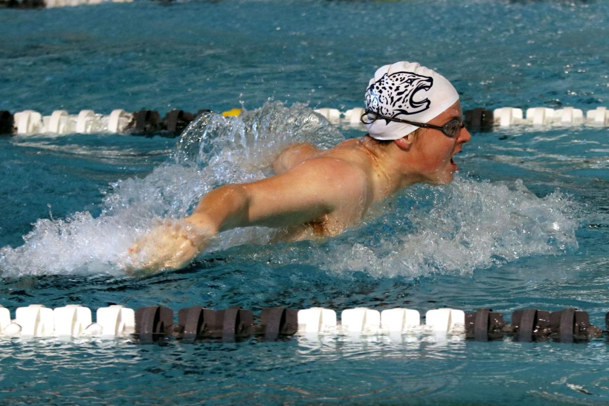 Freshman Andrew Buchwitz swims fly in the 200 yard medley relay.