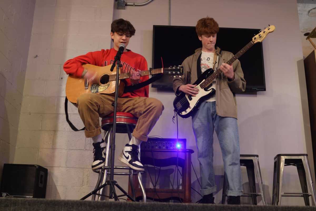Juniors Kai McGarry and Braden Evans perform an original song that they finished just before coming on stage.