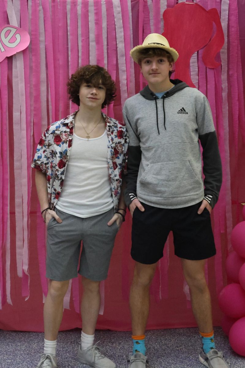 Freshmen Levi Schaffer and Gage Horn pose together in tropical outfits Friday Feb. 2. 