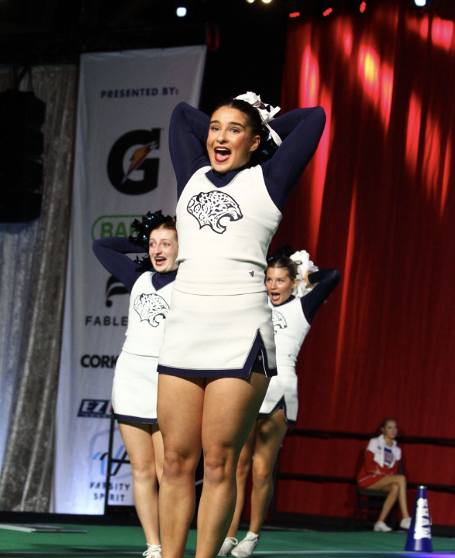 With an excited look on her face, senior Makenna Payne holds her arms behind her head Sunday, Jan. 21. 