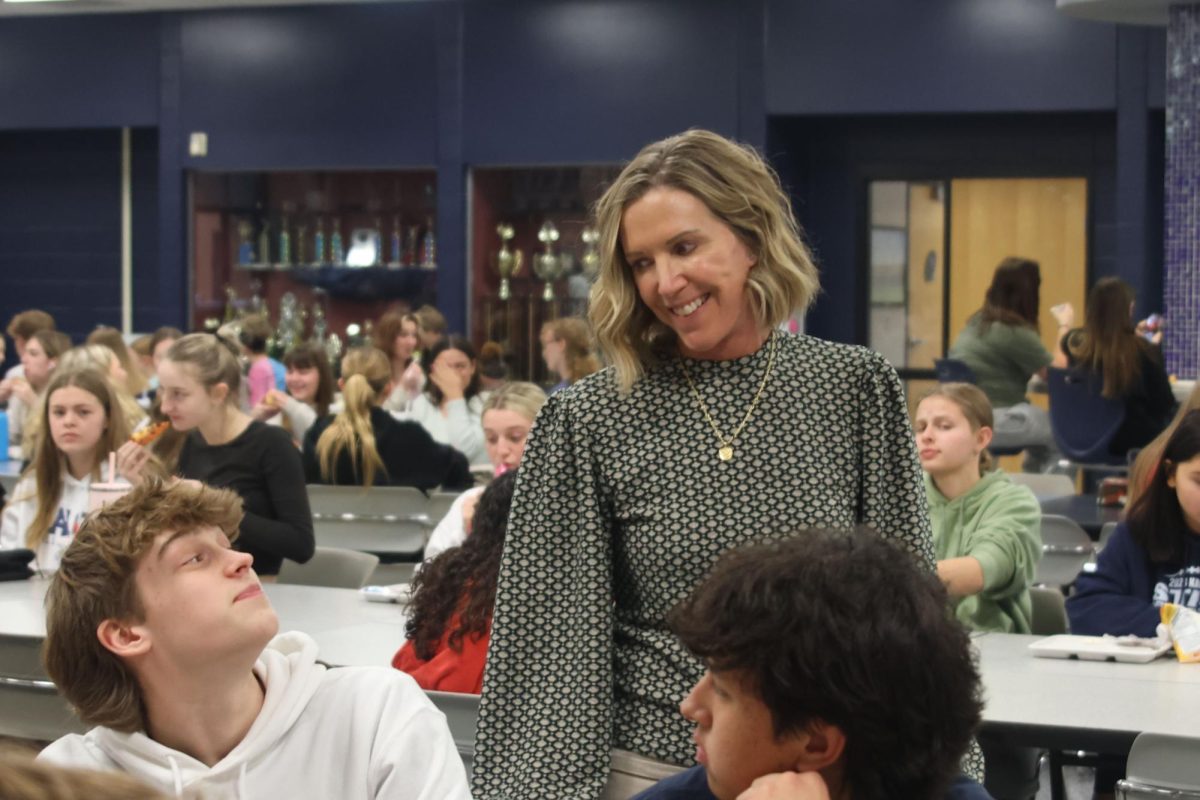 During third lunch, assistant principal Marilyn Chrisler jokes with sophomore Cannon Fields Wednesday, Feb. 28. Chrisler enjoys socializing with the students and spending her afternoons in the lunchroom.  