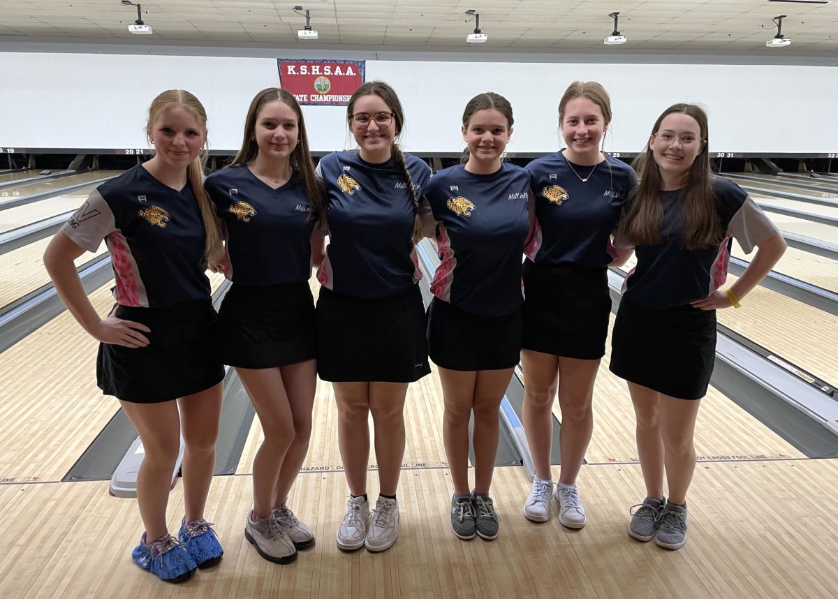 As a team senior Kiara Gonzalez, junior Molly Bahorst, sophomores Abby Haney, Layla Gonzalez, Bella Gonzalez, and freshman Ella Diehl pose for the picture