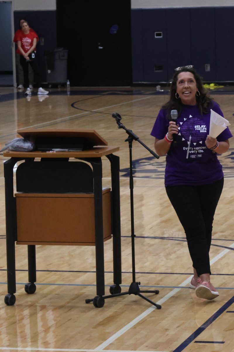 Lisa Herkenrath delivers a speech on how cancer impacted her life at the Fight Back Ceremony. 