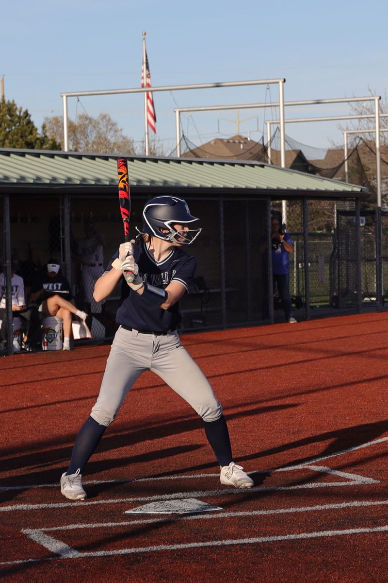 Looking ahead, sophomore Callie Caldwell gets ready to bat.