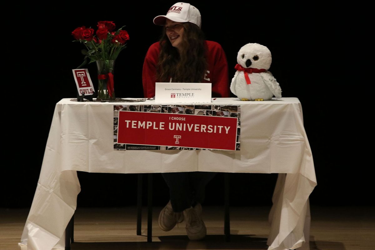 With a big smile, senior Grace Cormany prepares to head to Temple University.
