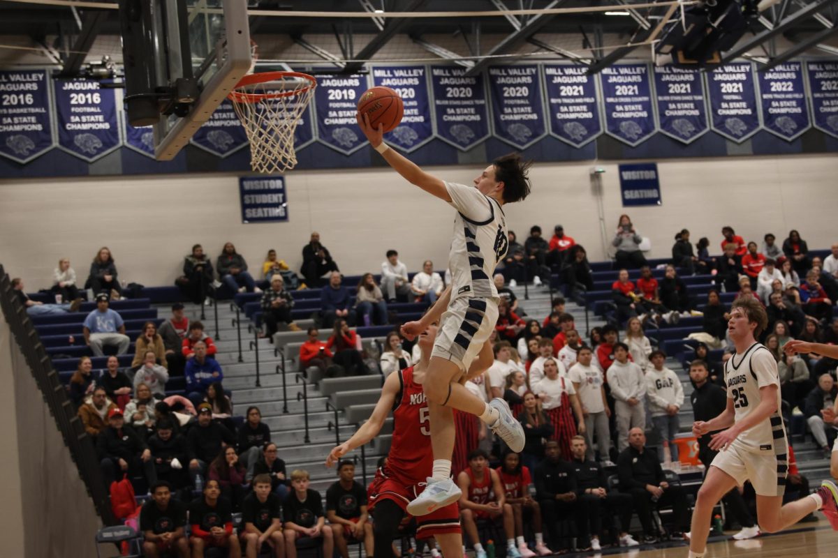 With his eyes on the net, junior Jack Carpenter looks to lay the ball into the net. 
