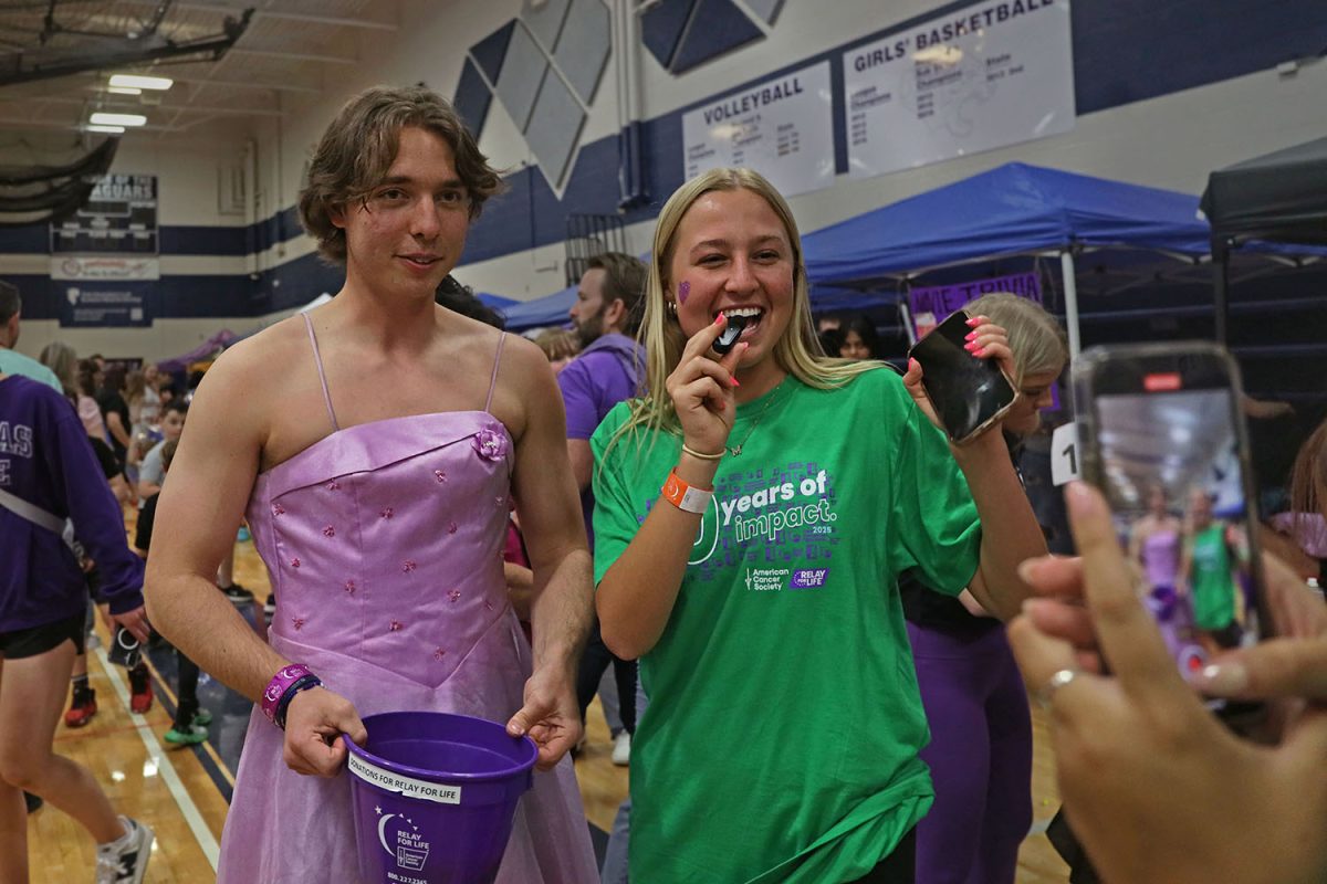 Filming for the Relay for Life instagram, senior Maggie Wieland interviews senior Ronan Myers about being a Mr. Relay contestant. 