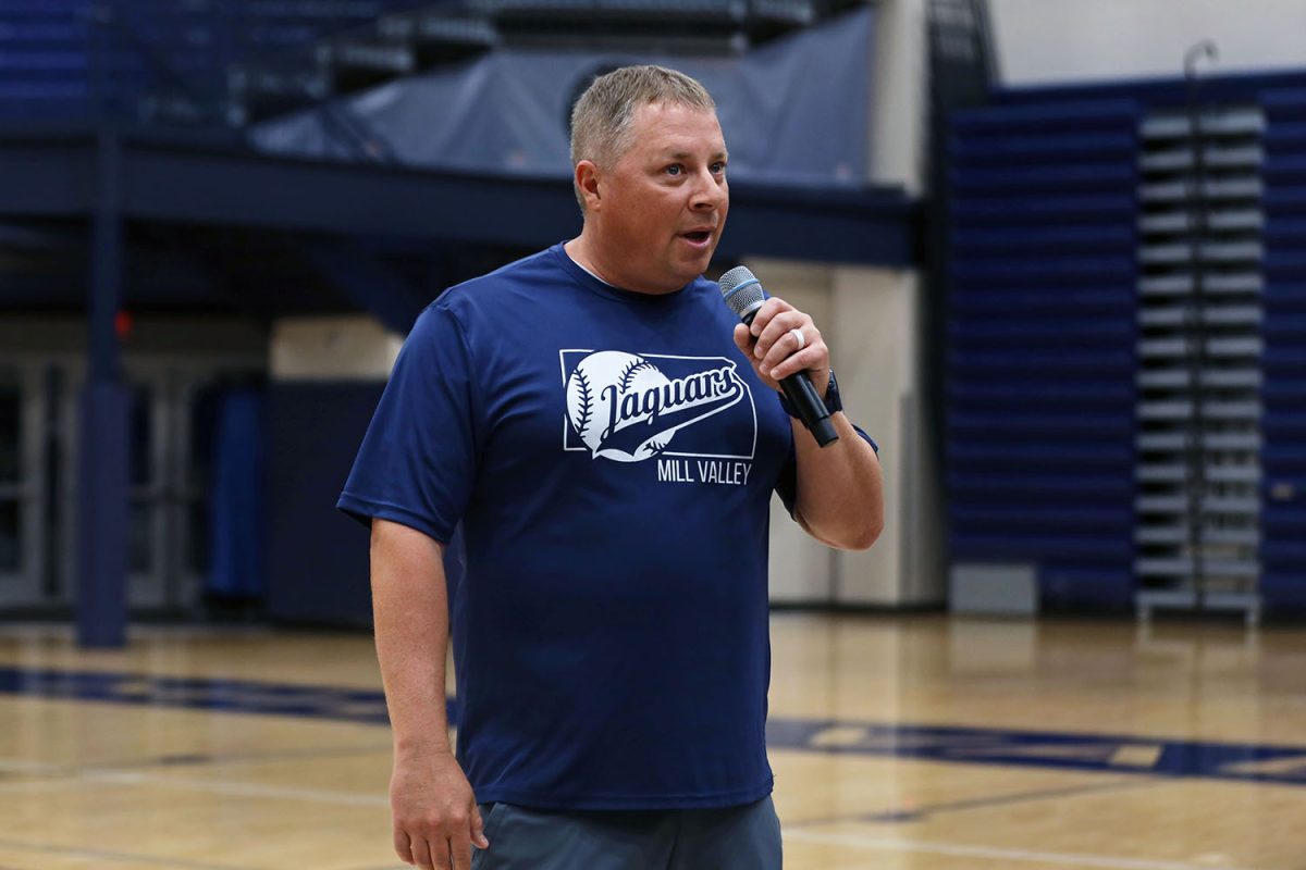 Social studies teacher George Walden speaks about his cancer experience during the Fight Back ceremony. 