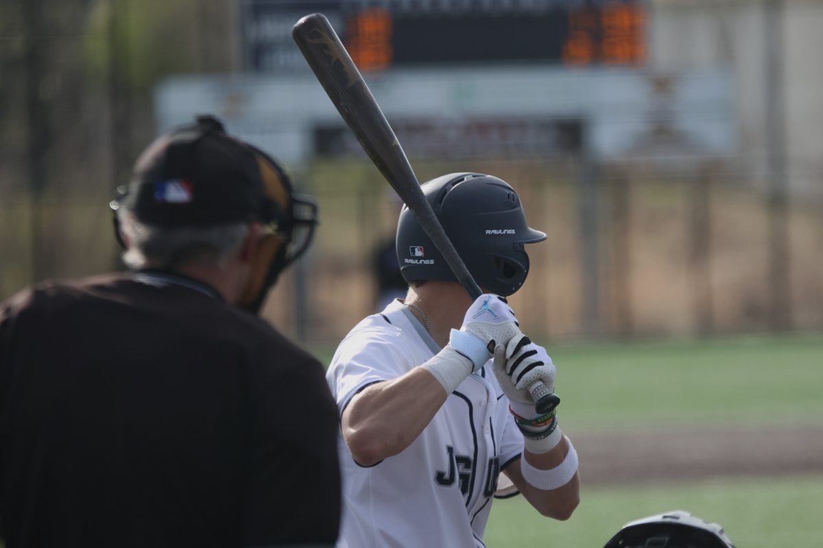 Junior Blake Jay has his hands ready, waiting for a pitch