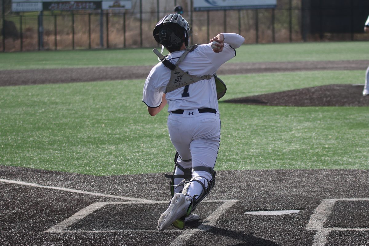 Senior Owen Gietzen throws down to second base 