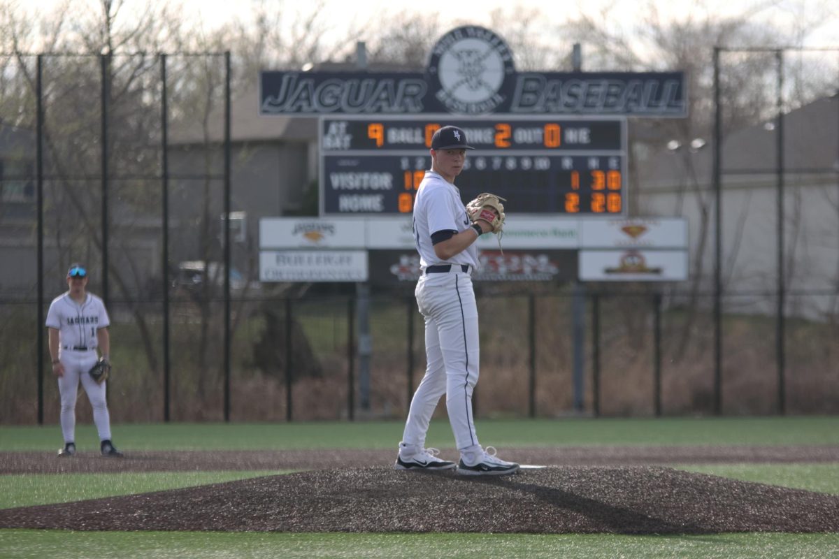 Looking at his catcher, junior Brandon Neis sees what pitch to throw