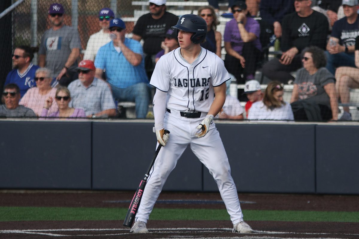 Senior Hudson Powers goes through his pre-pitch routine