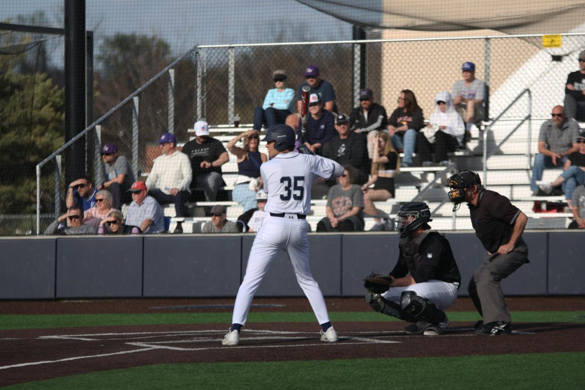 Senior Isaac Sauder prepares for the next pitch