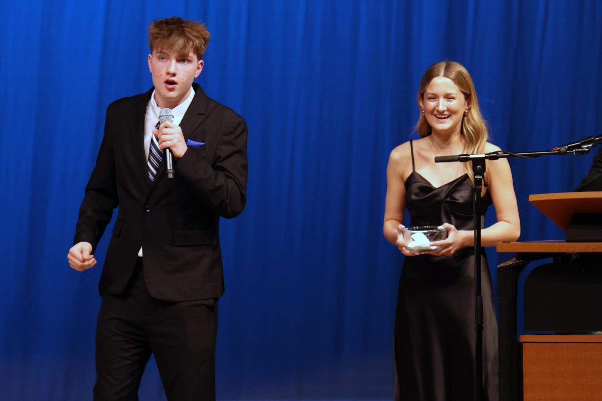 After being asked an interview question, freshman Jack Musil explains his morning routine to the audience.