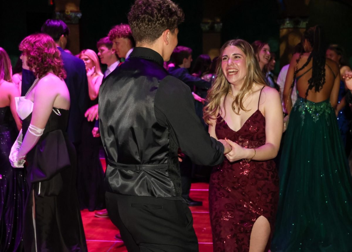 Hand in hand, sophomore Annabelle Singleton and junior Hayden Horn dance together.
