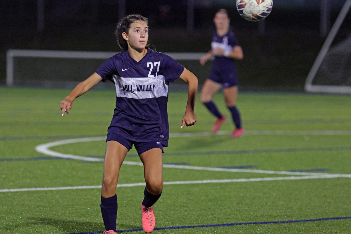 Sophomore Lannah Esquibel prepares to hit the ball with her head.