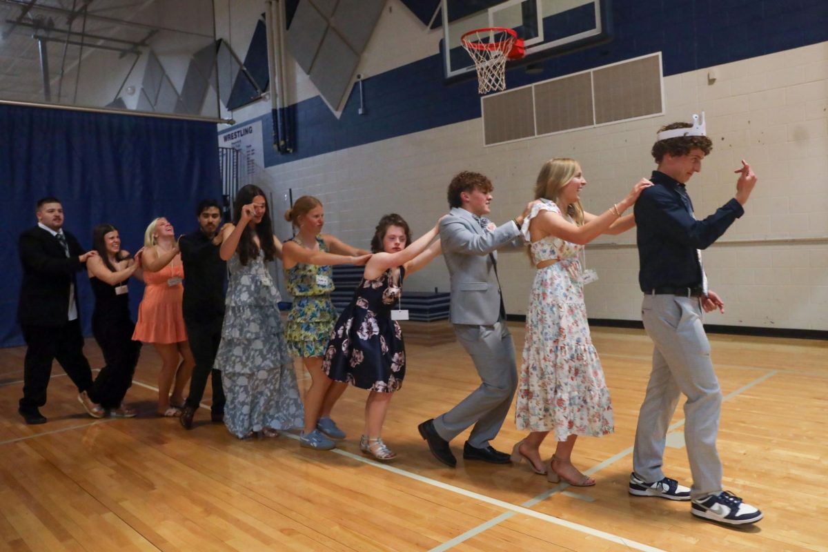 At Pops Prom on Saturday, April 26, students formed a conga line and danced to the music.