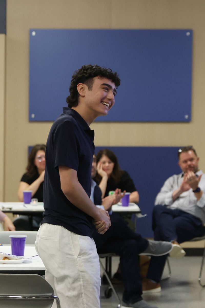 With a big smile, senior Maddox Walker takes recognition for his work on Relay For Life. 
