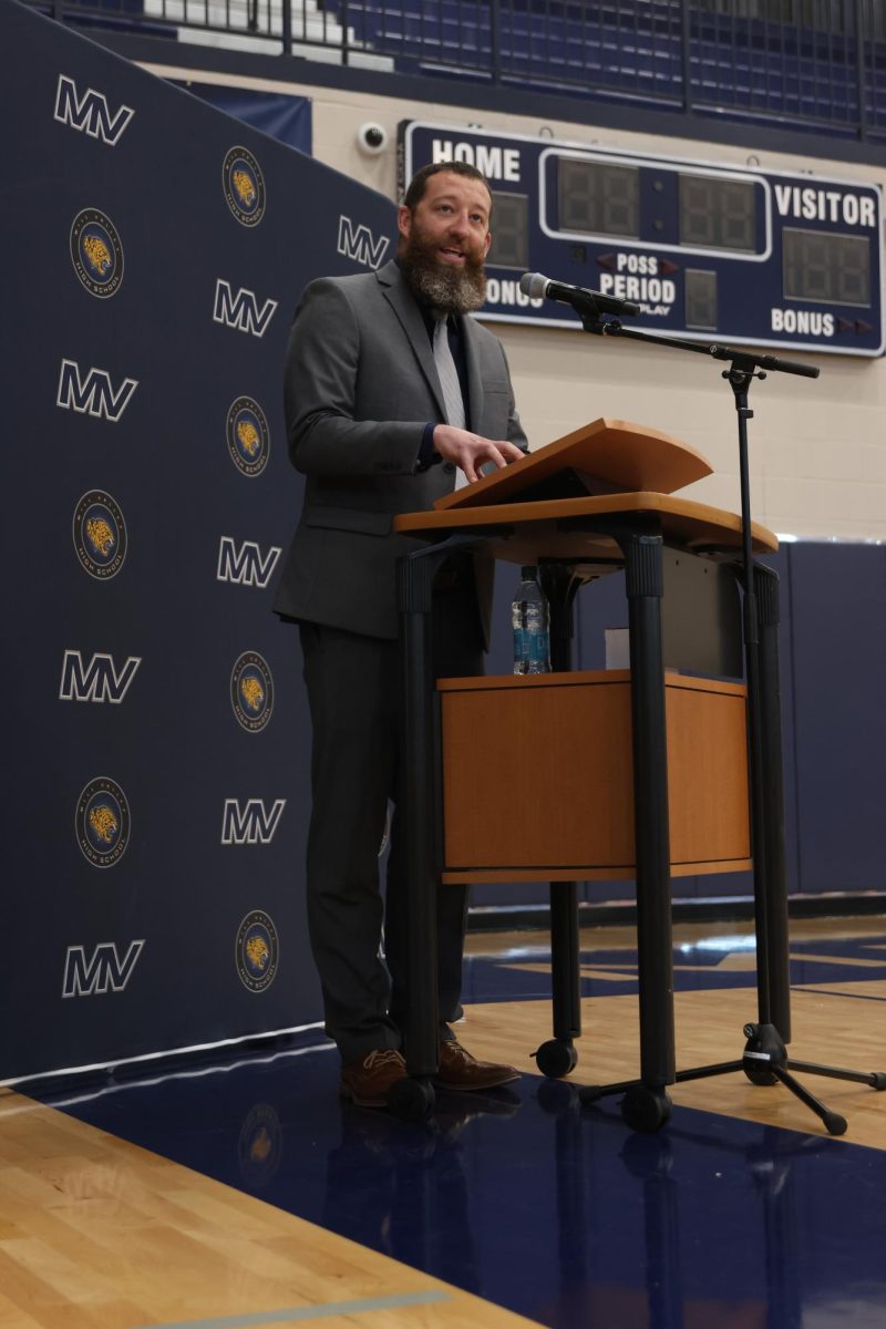Giving his speech, Athletic Director Brent Bechard talks at the signing day. 