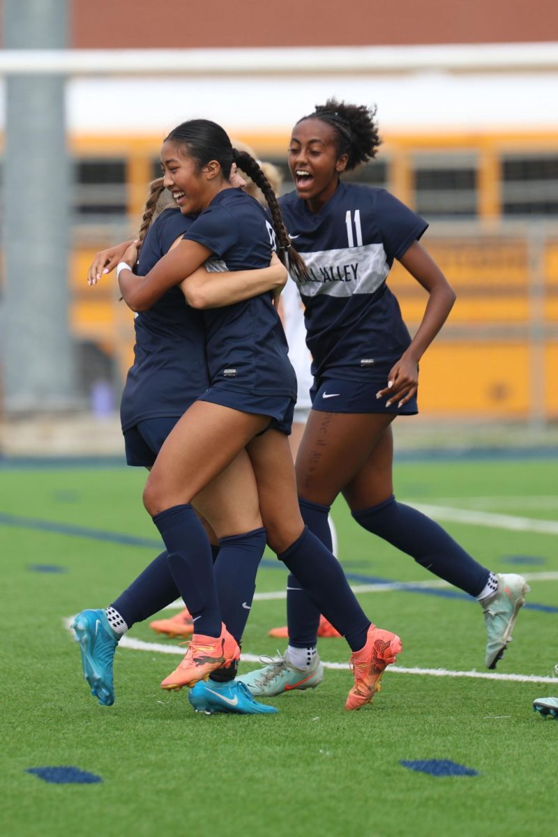 After scoring a goal, sophomore Lyci Manirad hugs teammate freshman Lyla Cinotto.
