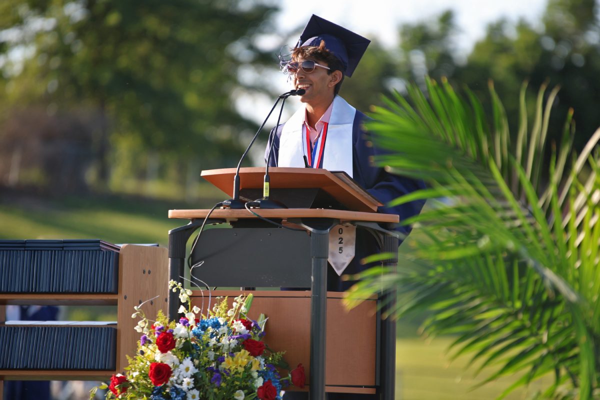 With a smile, senior valedictorian Shubh Patel gives his speech. 