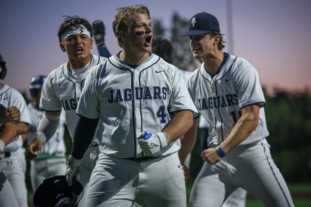 After his home run, sophomore Easton Engelhart yells towards the crowd.