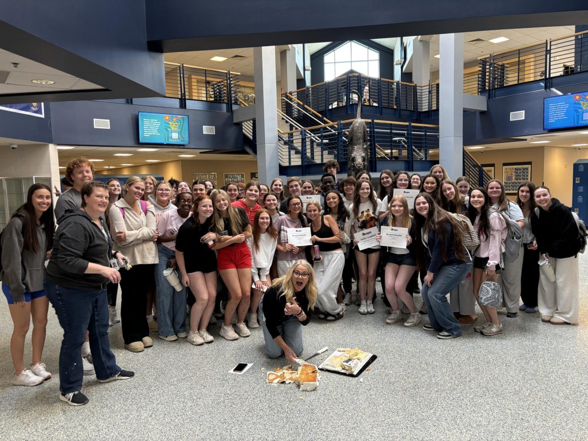 Yearbook, Newspaper and Broadcast staffs celebrate their All-Kansas award during their seminar celebration.