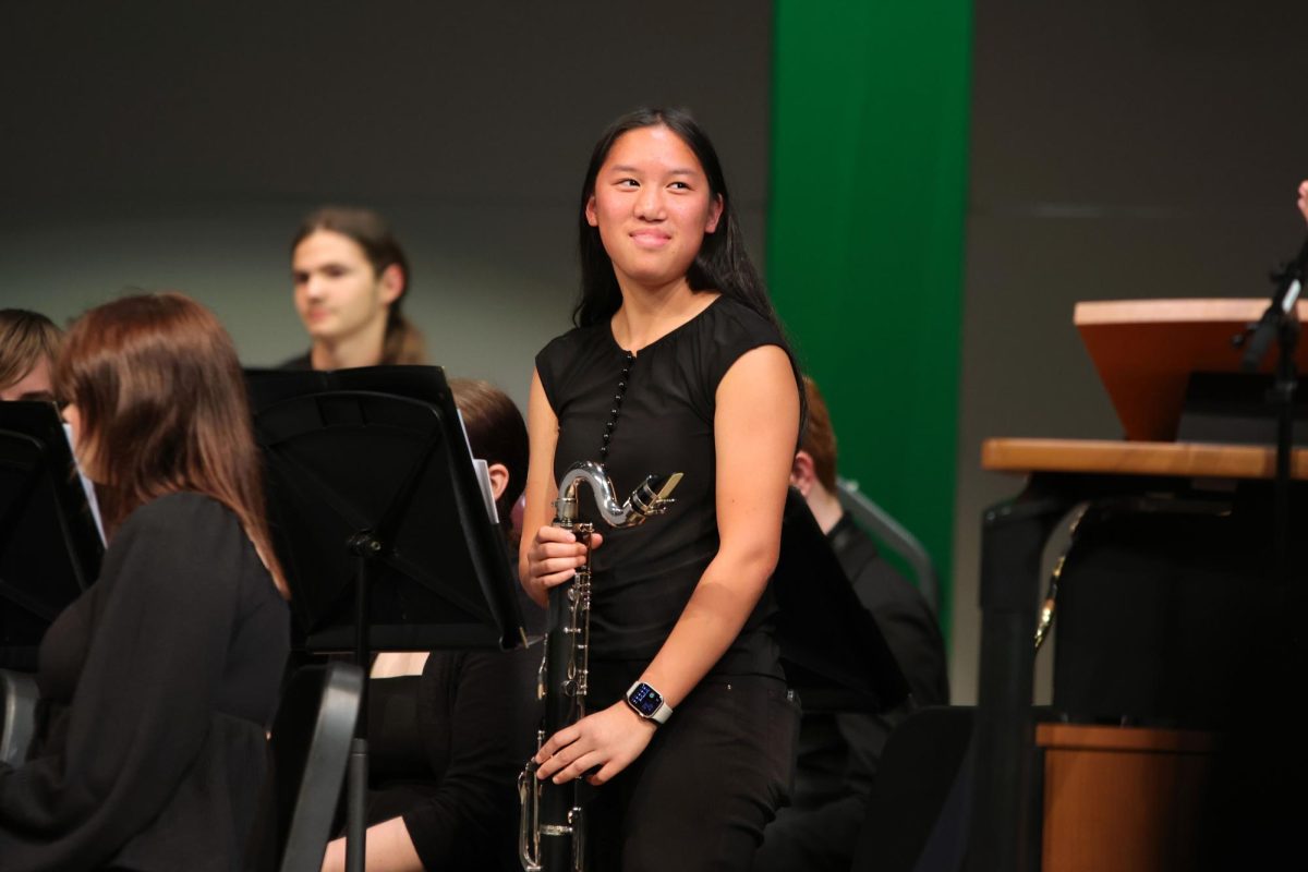 Freshman Effie Niewohner stands up after being recognized for her achievements. 
