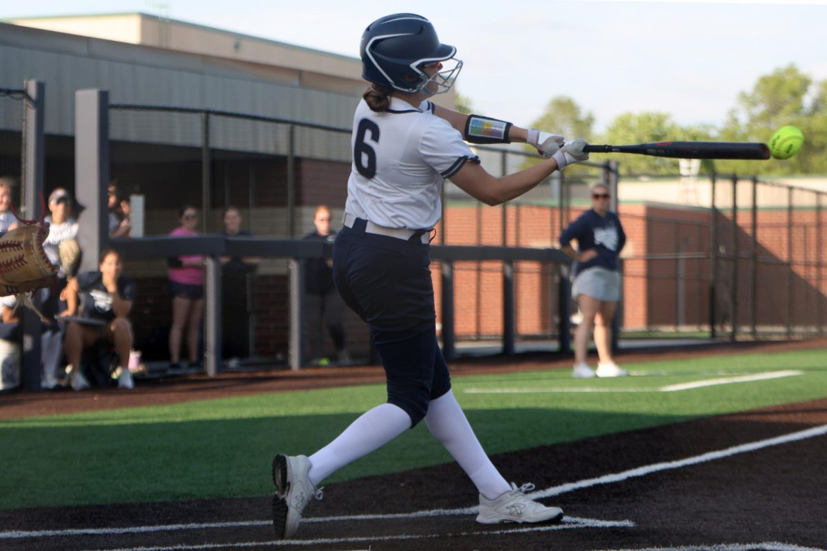 Up at the plate, sophomore Liv Peery hits the ball.