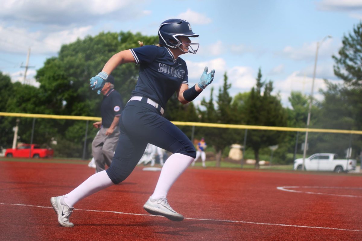 Sprinting, sophomore Addison Moeller makes it to home base and scores in the first round of the regional tournament Thursday, May 22..
