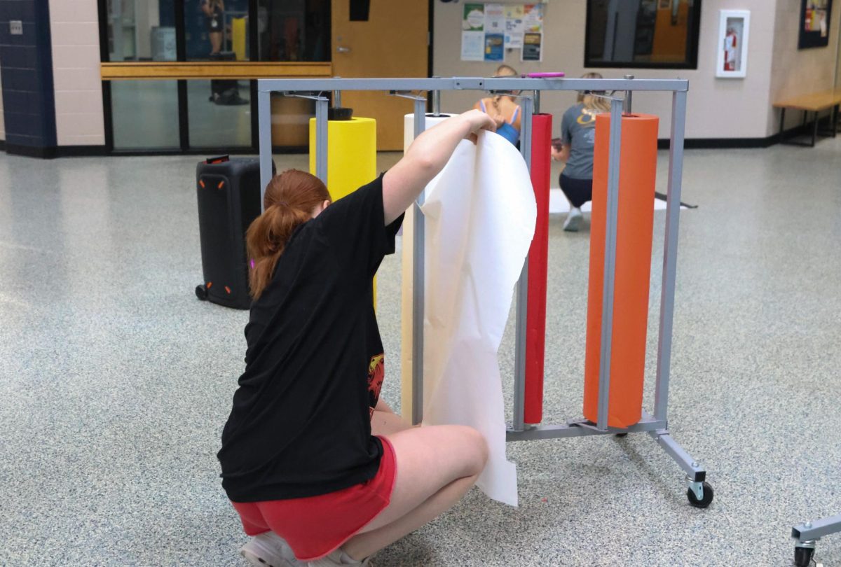 Junior Hadley Doyle rips off poster paper