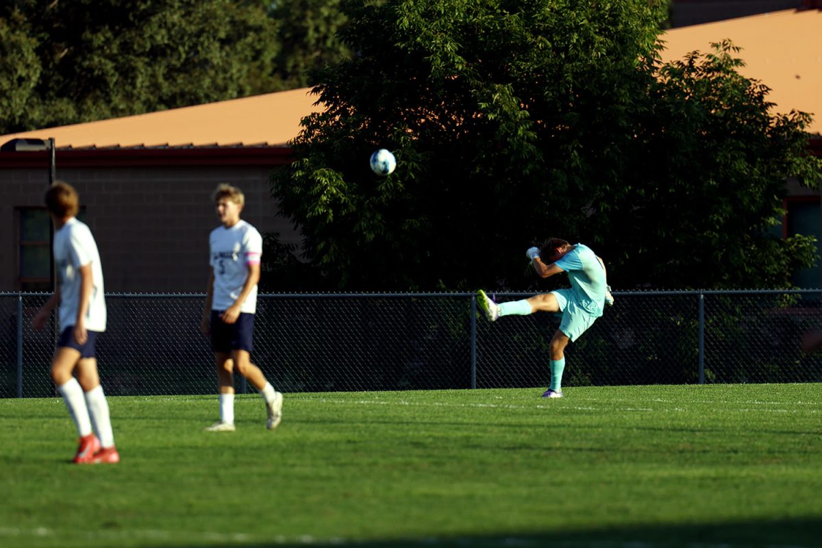 Junior Zane Hodson takes a goal kick after stopping an attack on goal. Tuesday Sept. 2.