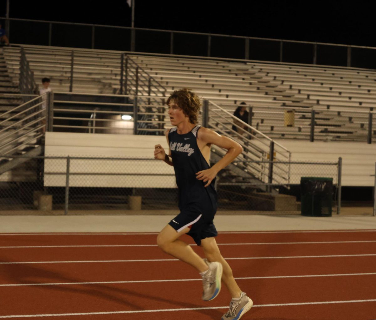 Sprinting hard, junior Jack Niewohnew approaches the finish.