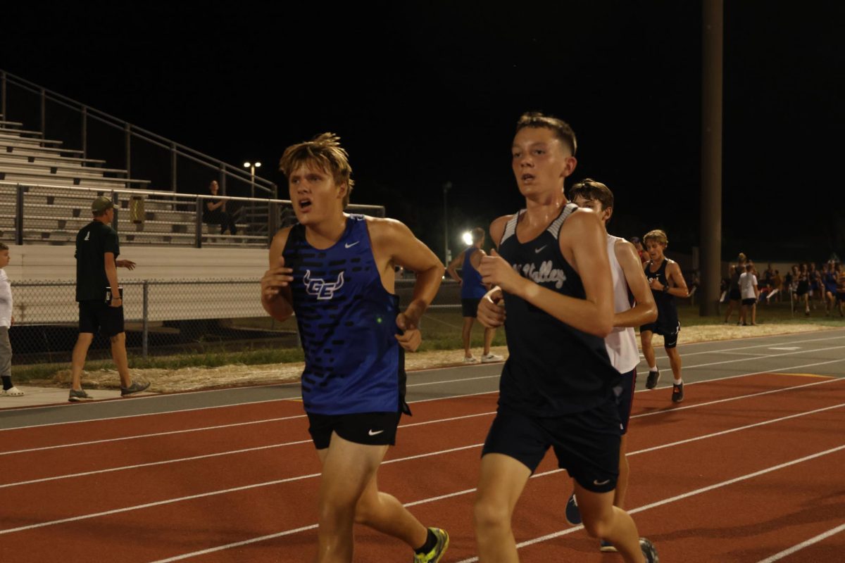 Sprinting past his opponent, sophomore Arthur Kaemmer gets closer to the end of the race.