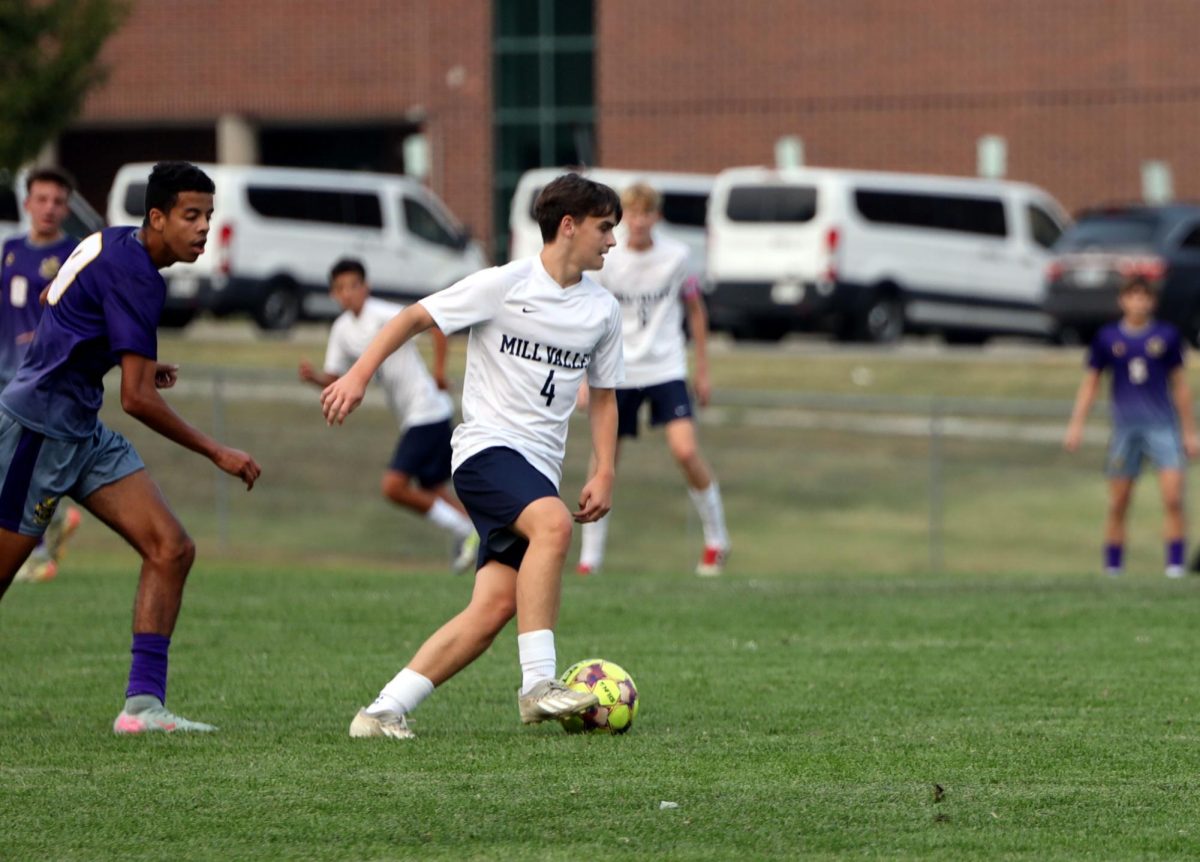 #4 is able to take control of the ball from the opposing defender during the game on Thursday Sept. 4.
