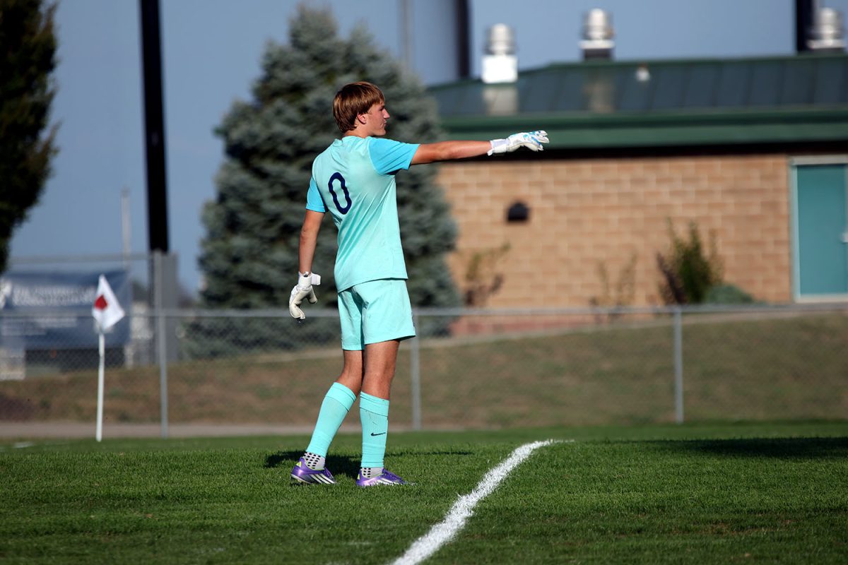 Goal keeper, junior Zane Hodson directs his teammates on what to do for the next play. Tuesday Sept. 2.