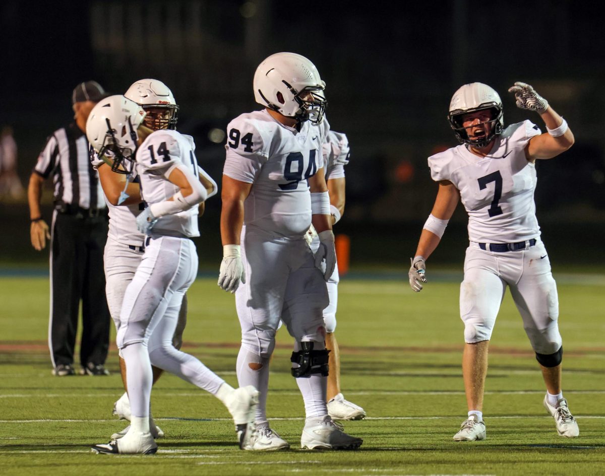 Senior Jaxon Garcia yells angrily about a flag on the play. 