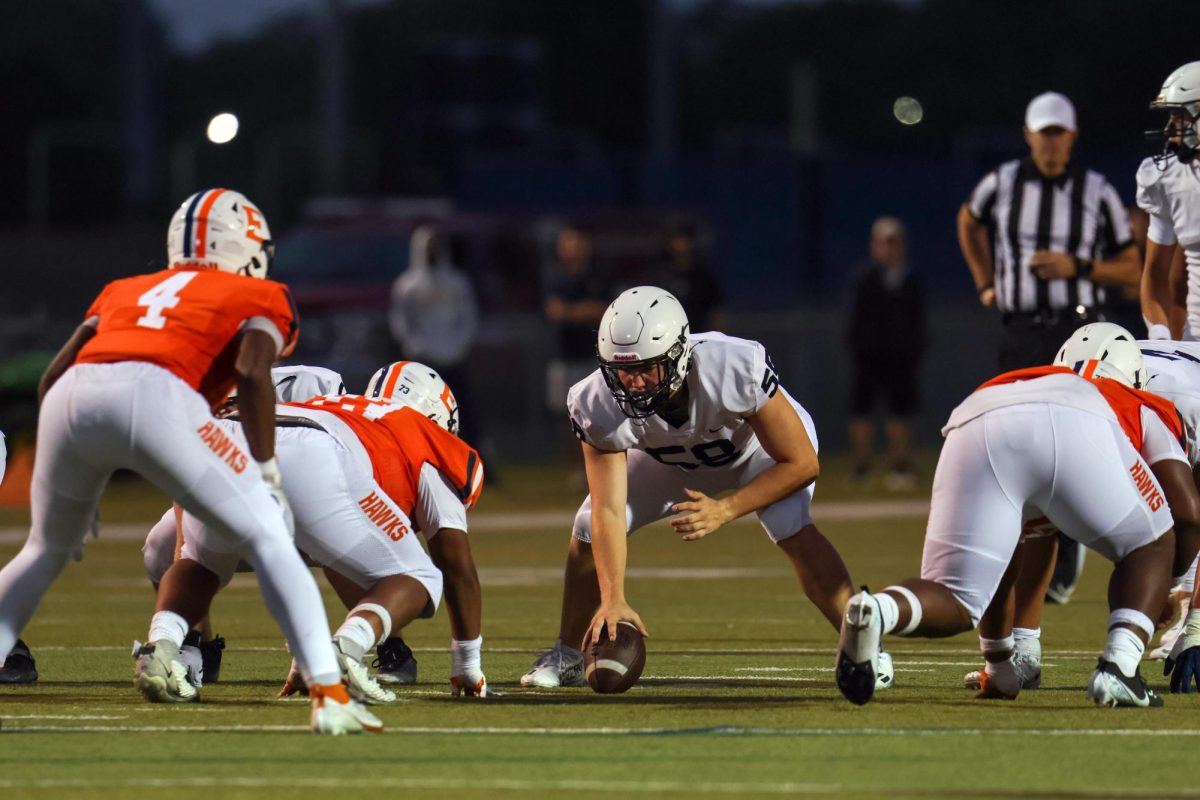 Senior Michael Fitzpatrick prepares to snap the ball